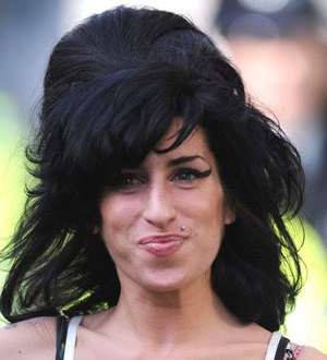Amy Winehouse's Back to Black dress sold for charity