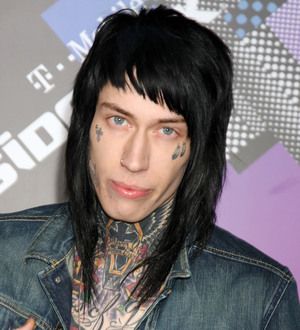Trace Cyrus shows off Indian head tattoo