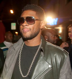 Usher gives Grammy Award to friend