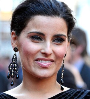 Nelly Furtado like a bird in new promo