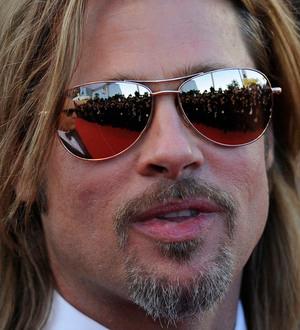 Brad Pitt defends gun laws