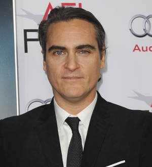 Joaquin Phoenix rallies stars to join pig protest
