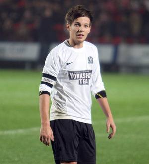 Louis Tomlinson triumphs at charity soccer match