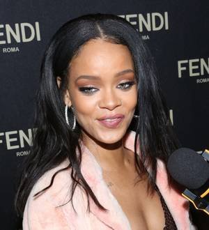 Rihanna recruits Kate Middleton's wedding dress designer for revealing new shoot