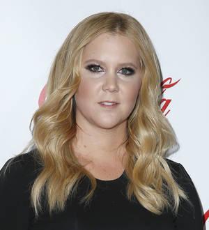 Amy Schumer pokes fun at Bill Cosby scandal in skit