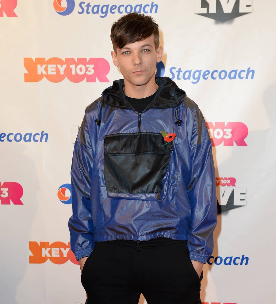 Louis Tomlinson unimpressed after DJ calls him 'ratty' during interview