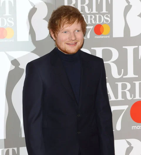 Chivalrous Ed Sheeran goes barefoot after girlfriend's shoe disaster
