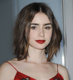 Lily Collins very happy with new boyfriend