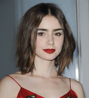 Lily Collins very happy with new boyfriend