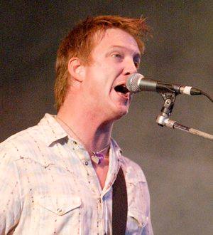 Homme sues former bandmates