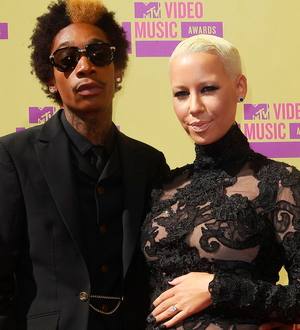 Amber Rose bares baby bump for photoshoot