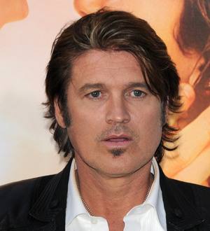 Billy Ray Cyrus visits Norway memorial