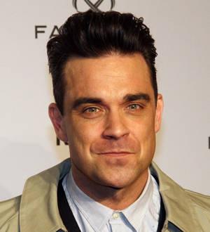 Robbie Williams denies Adele duet rumours