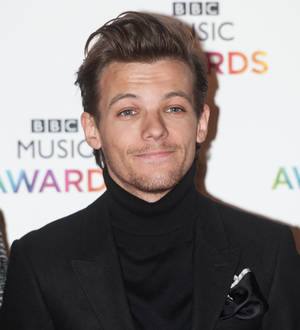 Louis Tomlinson eyes career as music mogul - report