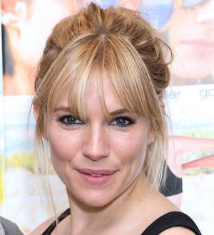 Sienna Miller sports rough hairdo at premiere