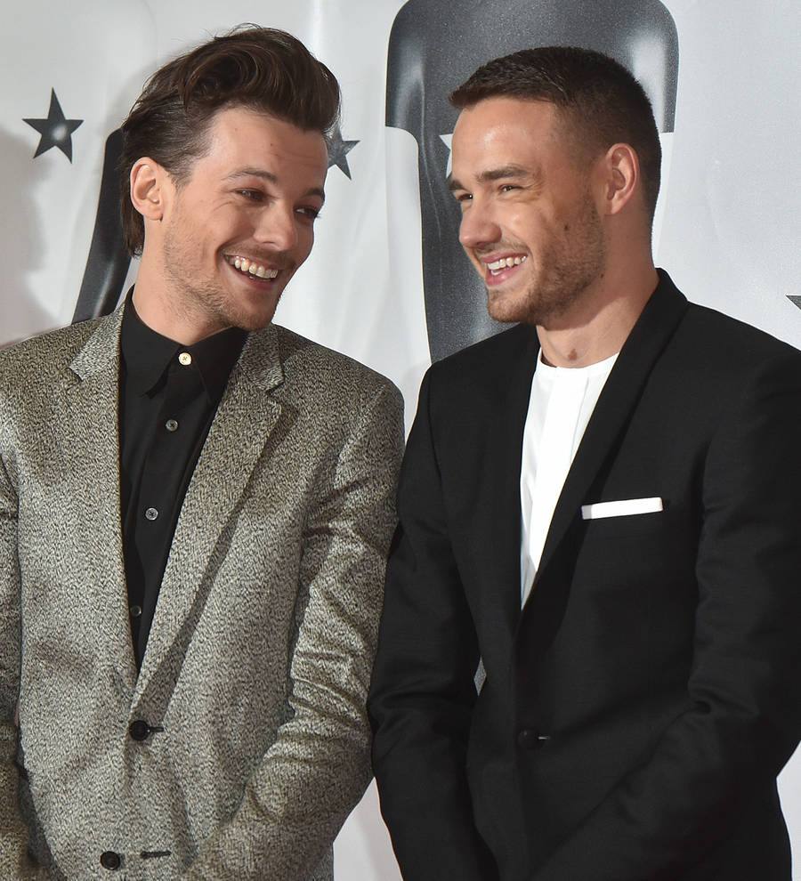 One Direction stars stage mini-reunion at Brit Awards