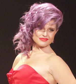 Stars take to the catwalk to raise awareness of heart disease