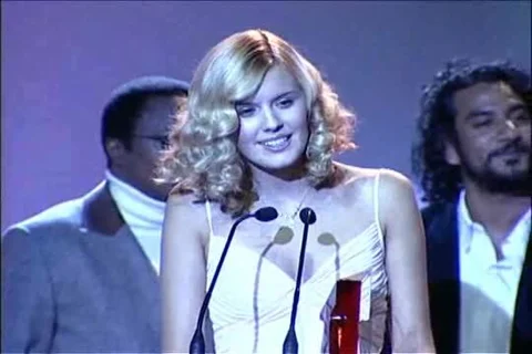 Naveen Andrews presents to Maggie Grace