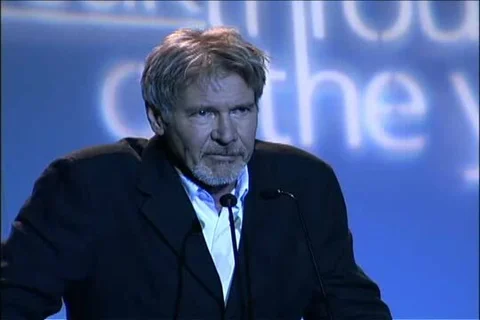 Harrison Ford presents to Mary Lynn Rajskub