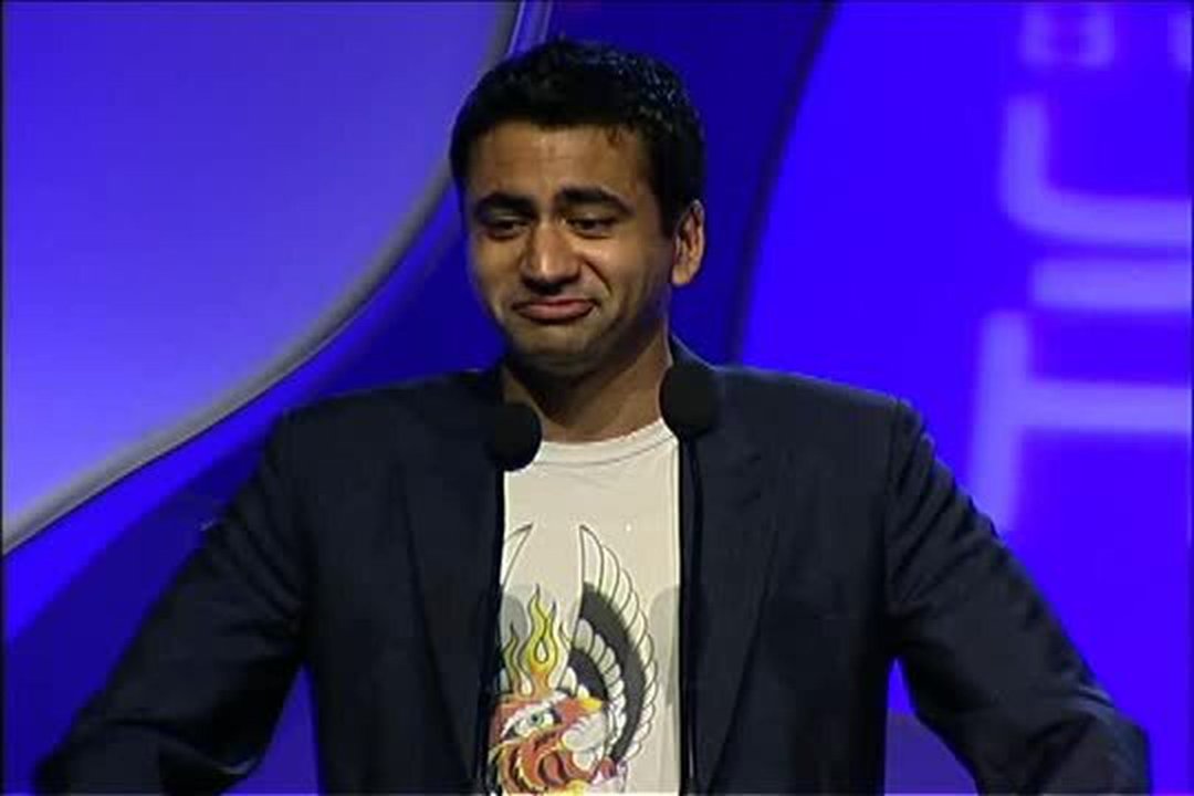 Kal Penn presents to Brandon Routh