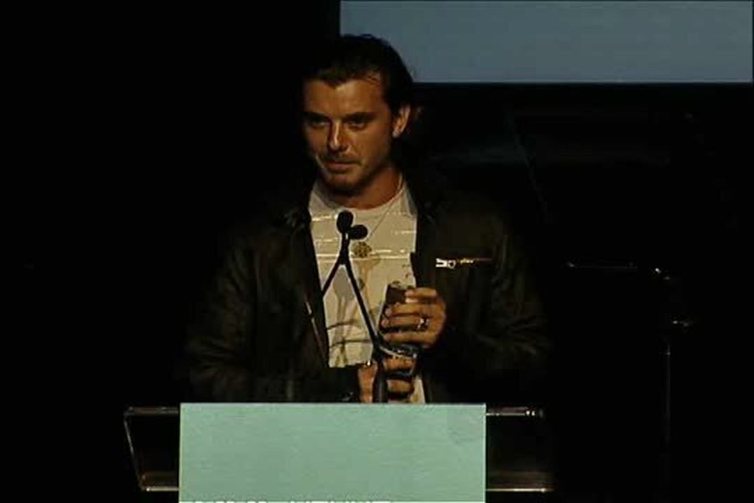 Josie Maran presents to Gavin Rossdale